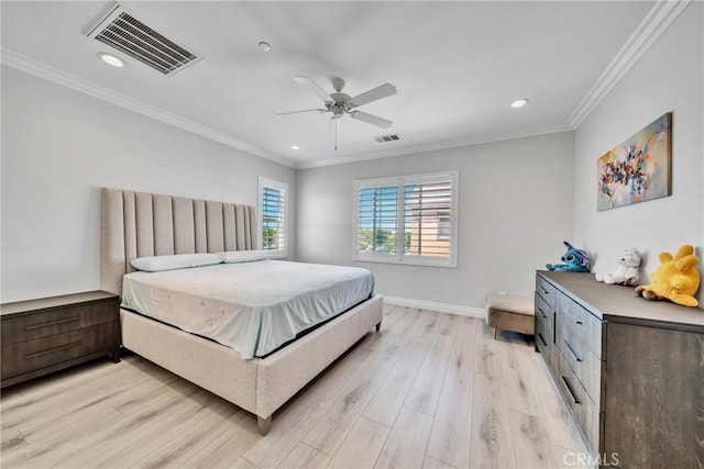 bedroom featuring ceiling fan, ornamental molding, and light hardwood / wood-style flooring