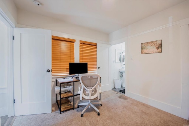 office space with light colored carpet