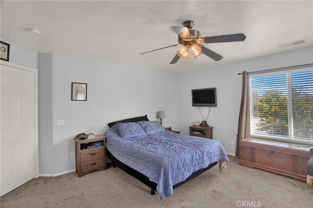 bedroom featuring carpet, ceiling fan, and baseboards