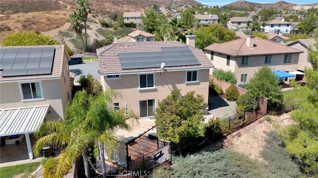 aerial perspective of suburban area featuring a mountainous background