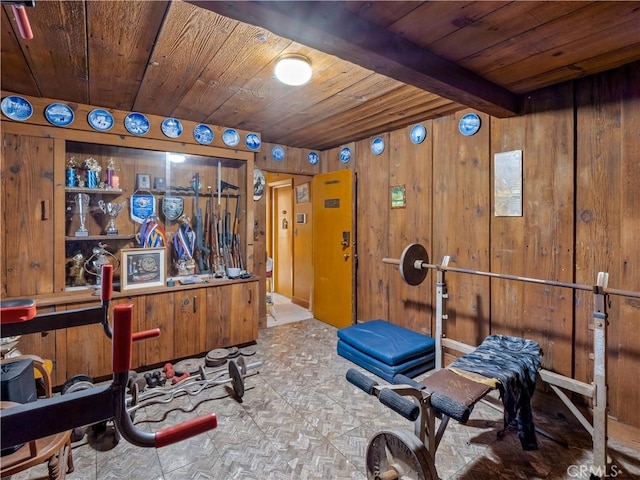 workout room with wooden walls and wooden ceiling