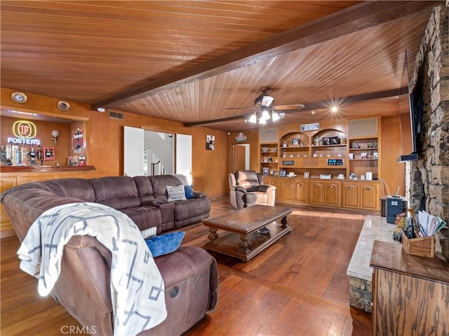 living room with ceiling fan, light hardwood / wood-style floors, wood ceiling, and beam ceiling