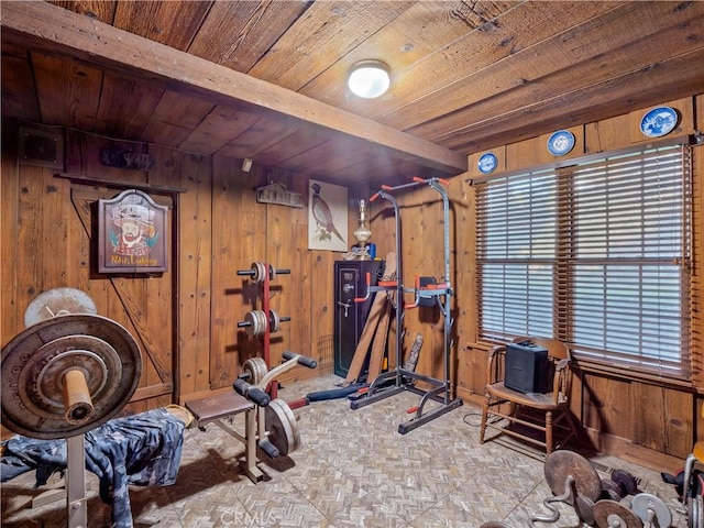 workout room with wood walls and wooden ceiling