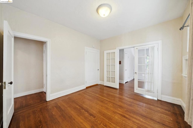 interior space featuring dark wood-type flooring and french doors