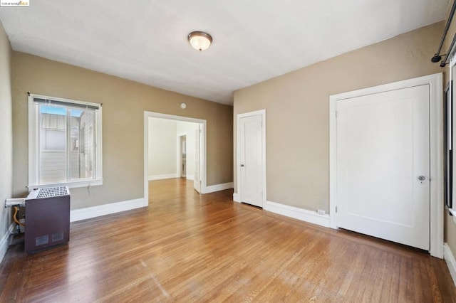 empty room with light wood-type flooring