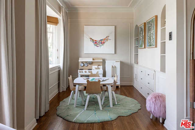 dining area featuring ornamental molding, dark hardwood / wood-style floors, and built in features