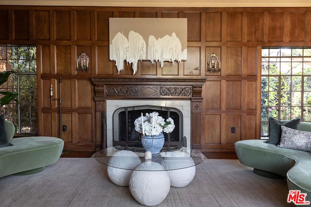 living room featuring wood walls