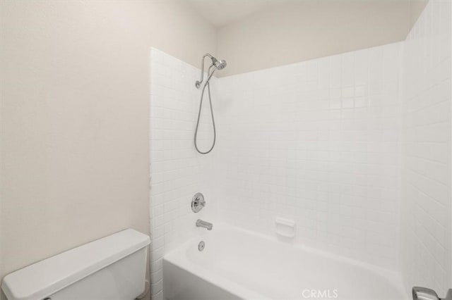 bathroom with toilet and washtub / shower combination