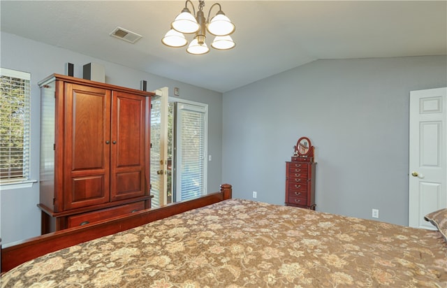 unfurnished bedroom with lofted ceiling, a notable chandelier, and multiple windows