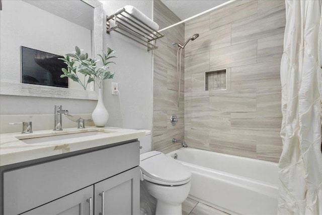 full bathroom featuring shower / bath combo, vanity, and toilet