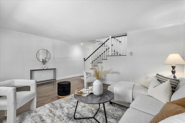 living room featuring crown molding and wood-type flooring