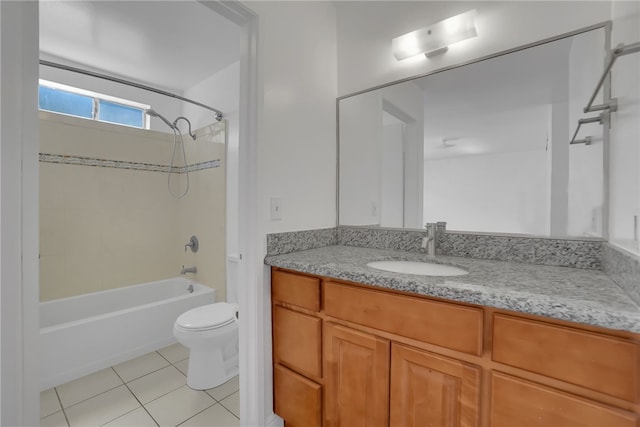 full bathroom with shower / bath combination, vanity, tile patterned floors, and toilet