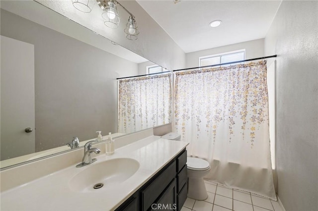 bathroom with vanity, shower / bath combination with curtain, tile patterned flooring, and toilet