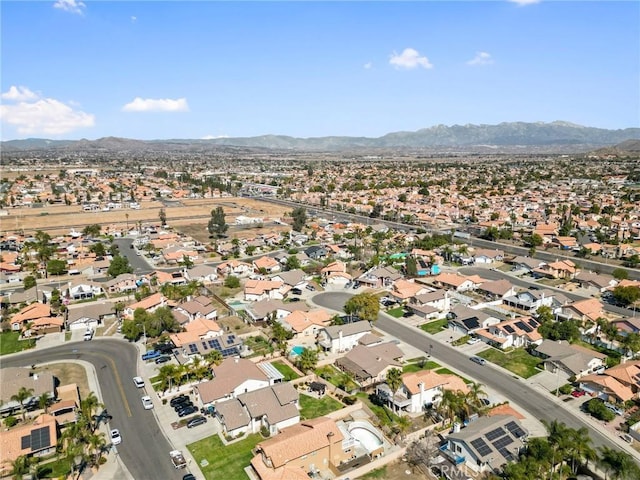 drone / aerial view with a residential view and a mountain view