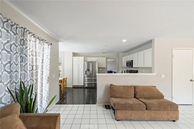 tiled living room with recessed lighting