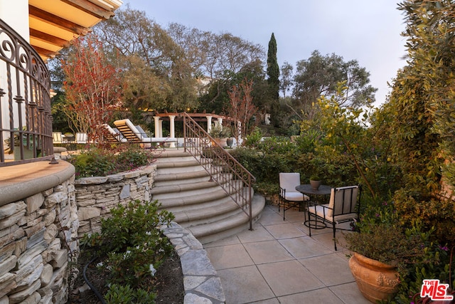 view of patio featuring a playground