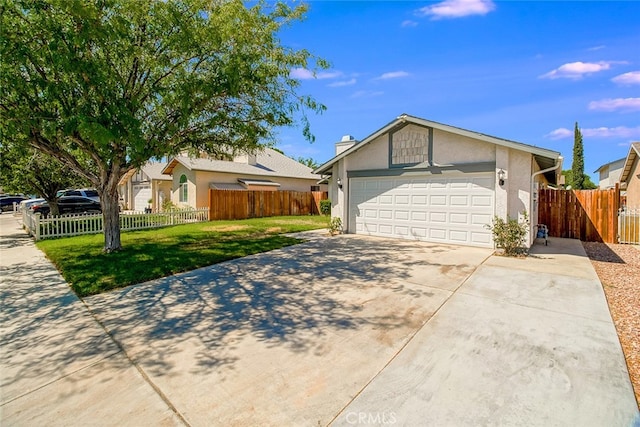 ranch-style house featuring a front yard and a garage