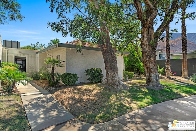 view of front of home with a mountain view