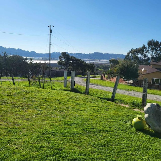 exterior space with a rural view