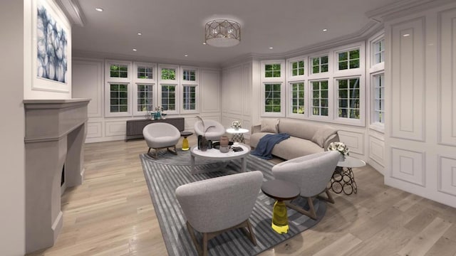 living room featuring light hardwood / wood-style flooring and ornamental molding