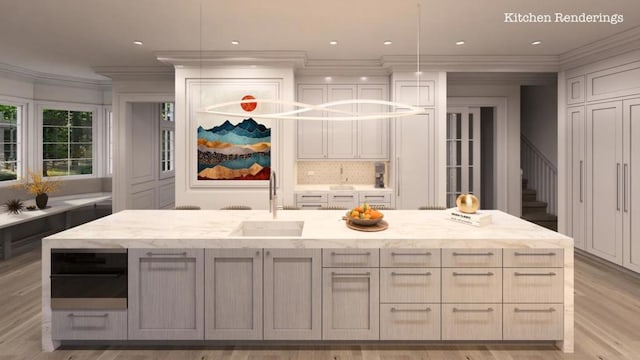 kitchen featuring a kitchen island with sink, crown molding, and light stone counters