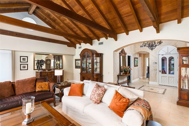 living room with visible vents, high vaulted ceiling, arched walkways, wood ceiling, and beamed ceiling