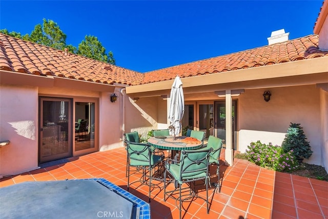 view of patio featuring outdoor dining space