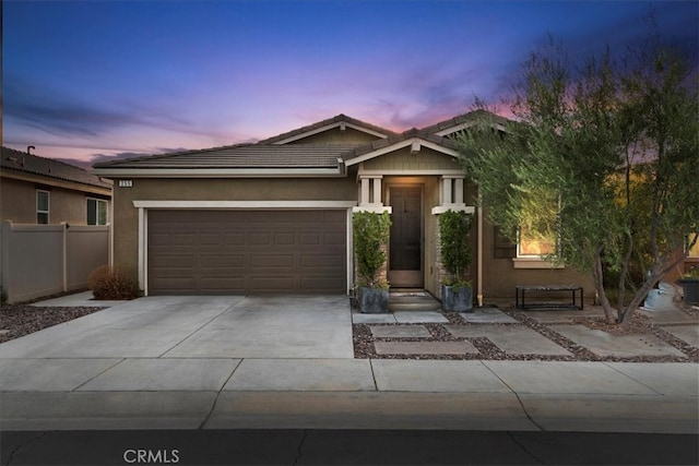 view of front of property with a garage