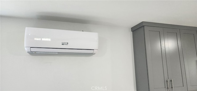 room details featuring an AC wall unit