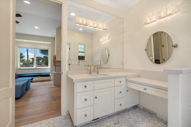 bathroom featuring vanity and wood-type flooring