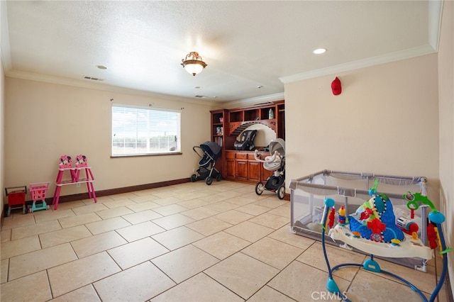 game room with light tile patterned floors and crown molding