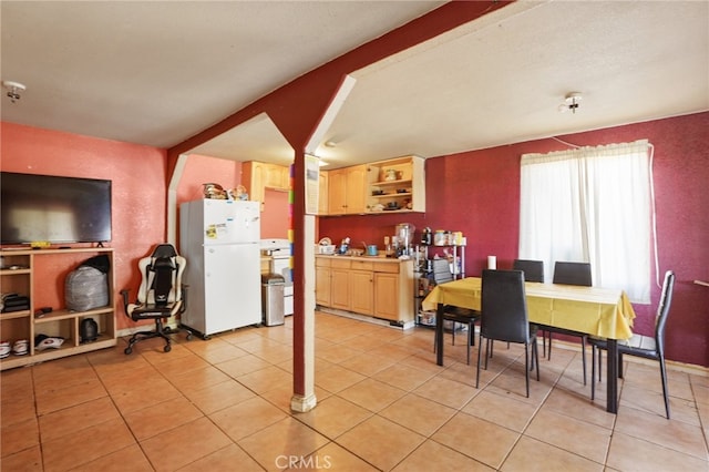 view of tiled dining space