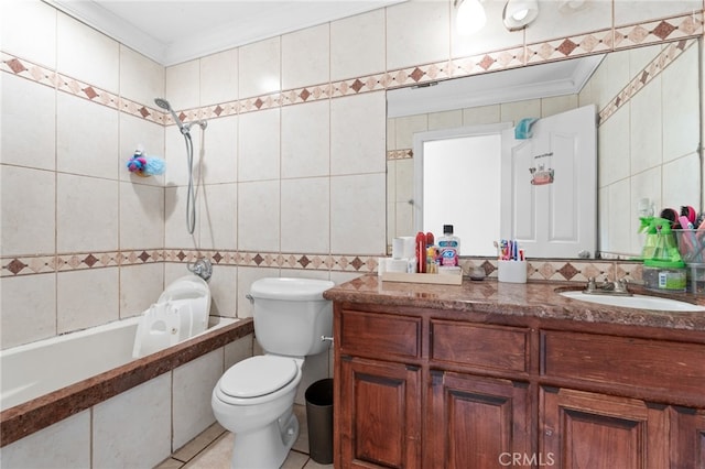 full bathroom featuring crown molding, tile walls, vanity, and tiled shower / bath