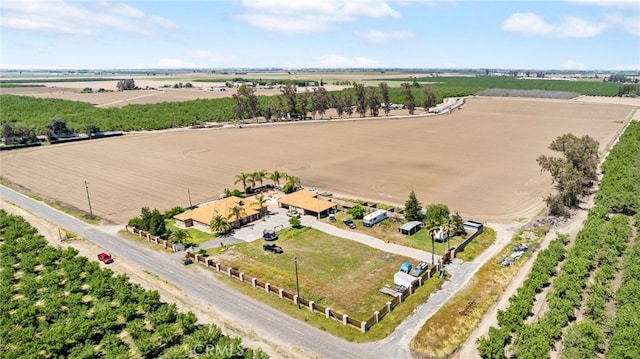 birds eye view of property featuring a rural view