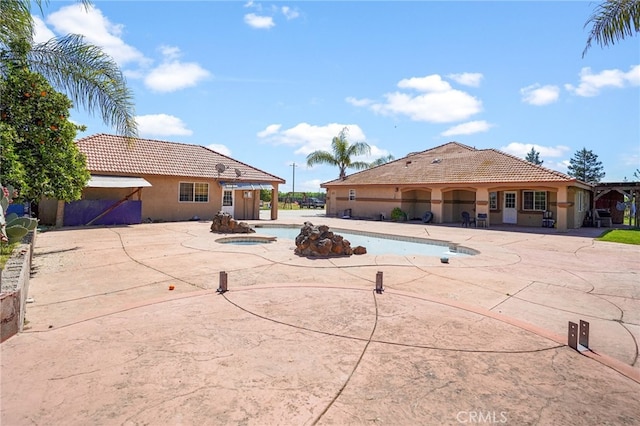 view of pool with a patio