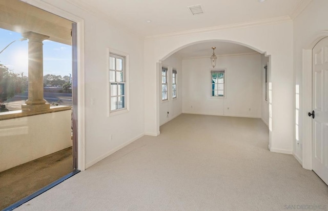 carpeted empty room with ornamental molding