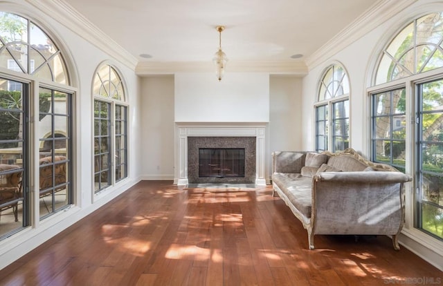 interior space with crown molding and dark hardwood / wood-style flooring