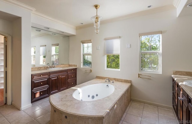 bathroom featuring a tub, tile patterned flooring, and a wealth of natural light