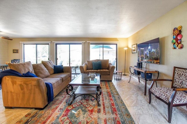 living room with ceiling fan