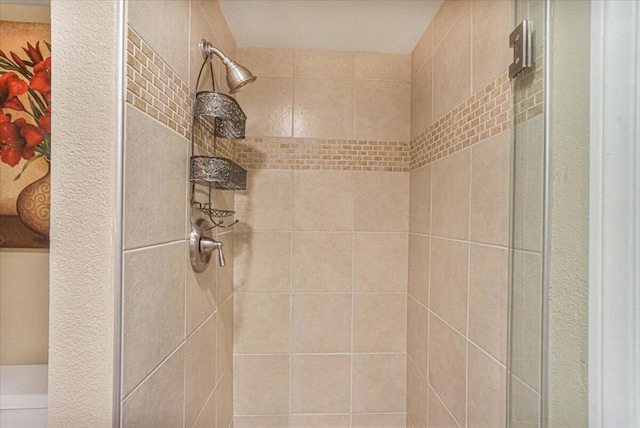 details featuring a tile shower