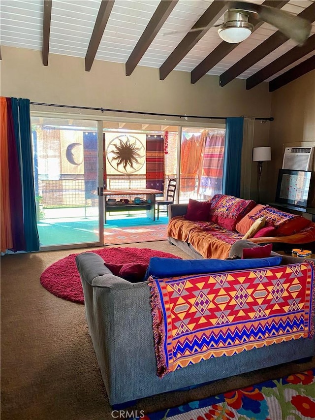 living room with vaulted ceiling with beams and carpet floors