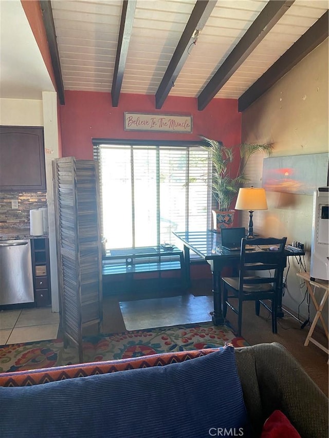 living room featuring lofted ceiling with beams