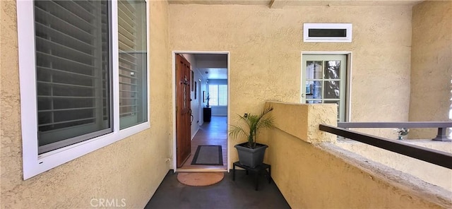 property entrance with a balcony