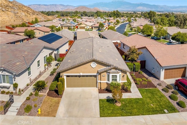 drone / aerial view featuring a mountain view