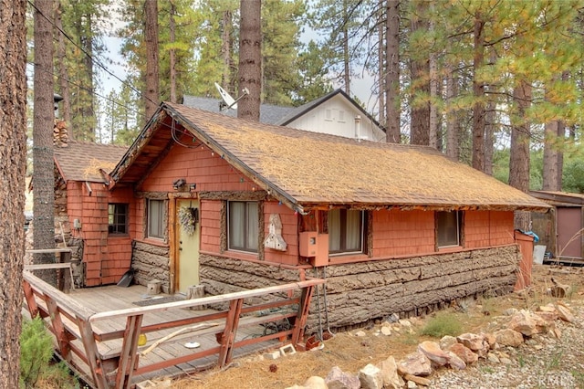 view of front of property with a deck