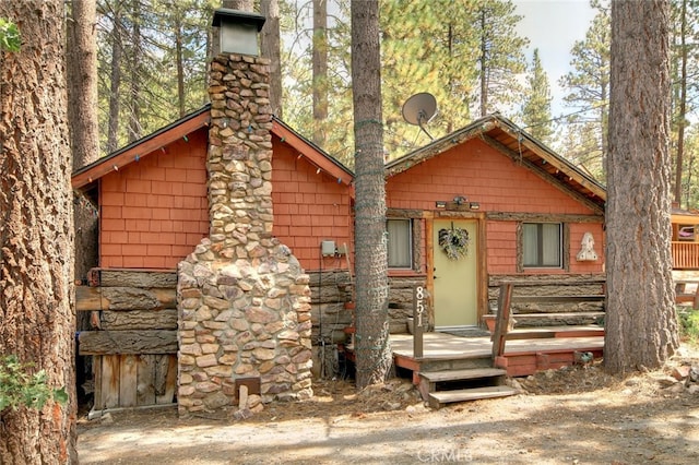 view of log-style house