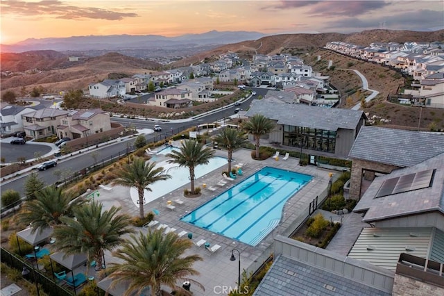 aerial view at dusk with a mountain view