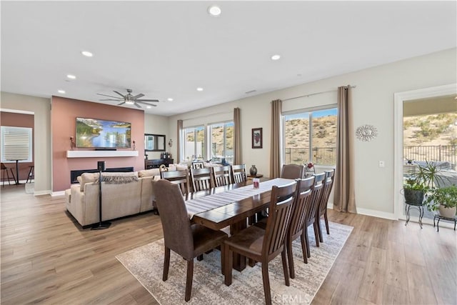 dining area featuring light wood-type flooring