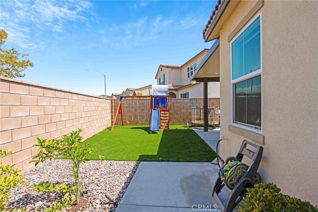 view of yard featuring a playground