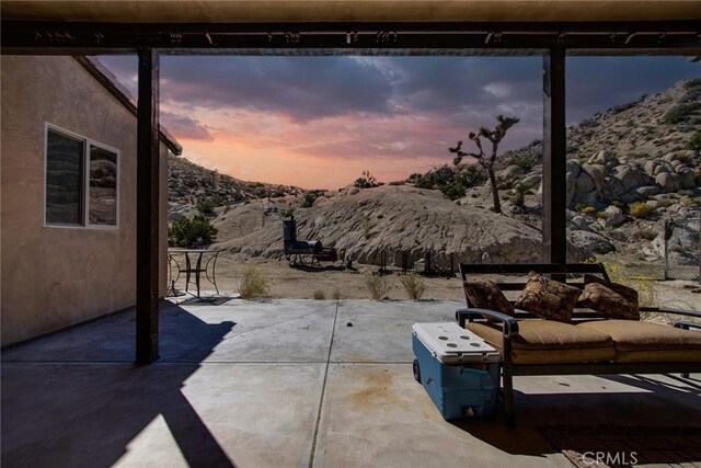 56245 Cobalt Rd, Yucca Valley, CA 92284 - view of patio / terrace with a mountain view